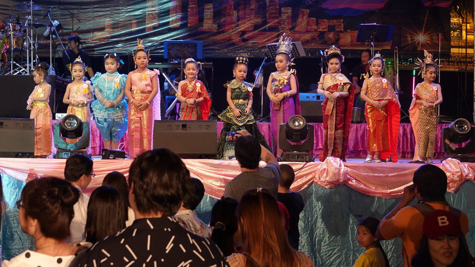 Children dress up in traditional costumes for a Nang Noppamas pageant contest in Lam Luk Ka district, Pathum Thani.