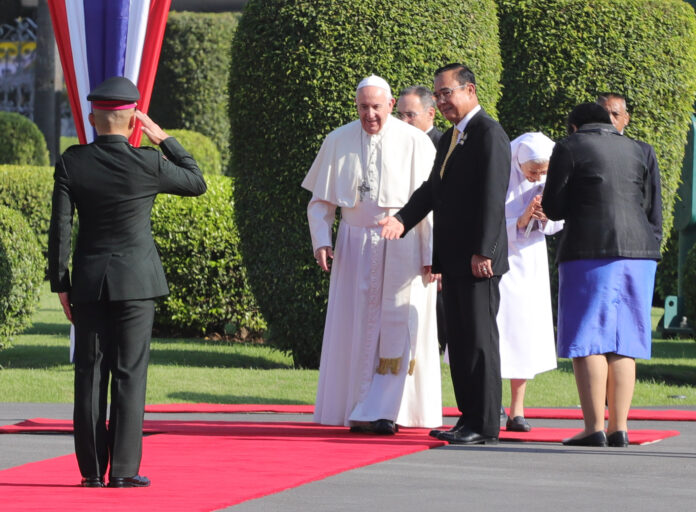 Pope Francis accompanied by his cousin Ana Rosa Sivori arrives for a welcome ceremony at the Government House courtyard, Thursday, Nov. 21, 2019, in Bangkok, Thailand. (AP Photo/Gregorio Borgia)