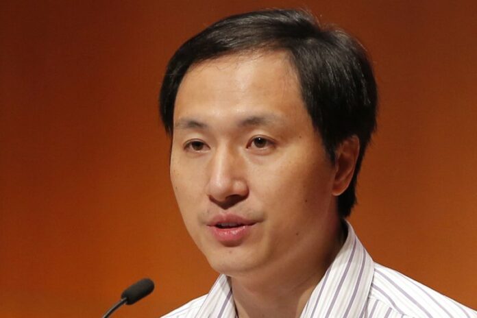In this Nov. 28, 2018, file photo, He Jiankui, a Chinese researcher, speaks during the Human Genome Editing Conference in Hong Kong. Chinese scientist He Jiankui shocked the world by claiming he had helped make the first gene-edited babies. (AP Photo/Kin Cheung, File)