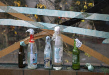 UN Rights Office Urges Hong Kong De-escalation Molotov cocktails are left over at the Hong Kong Polytechnic University campus in Hong Kong on Tuesday, Nov. 19, 2019. Police tightened their siege of the university campus where hundreds of protesters remained trapped overnight Tuesday in the latest dramatic episode in months of protests against growing Chinese control over the semi-autonomous city. Photo: Ng Han Guan / AP