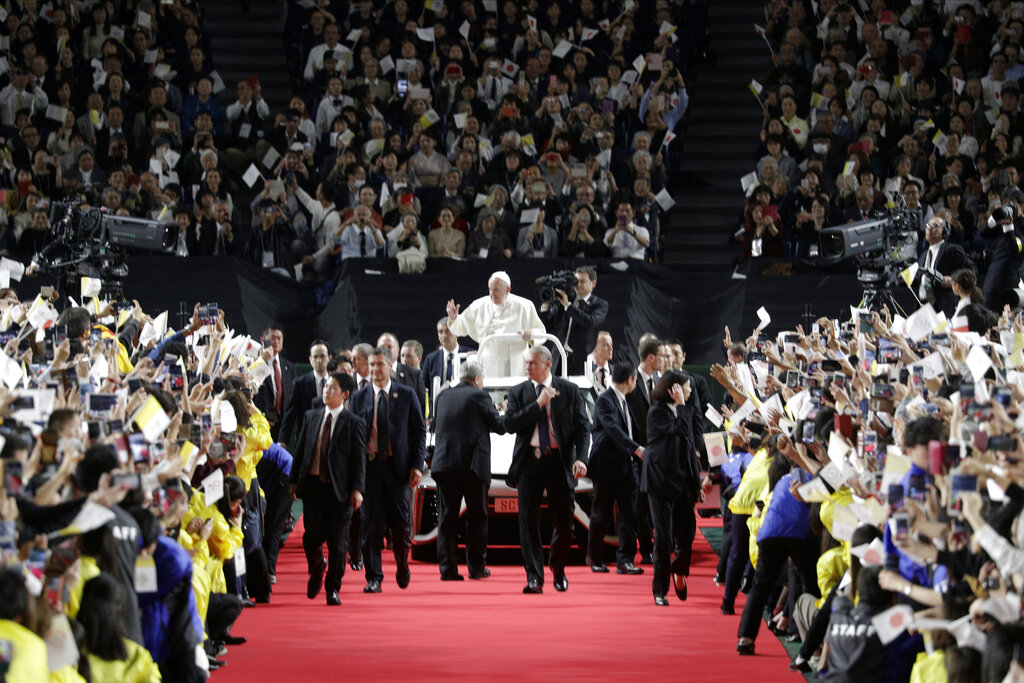 Pope Francis waves from Popemobile as he arrives for Holy Mass at Tokyo Dome Monday, Nov. 25, 2019, in Tokyo. Photo: Gregorio Borgia / AP