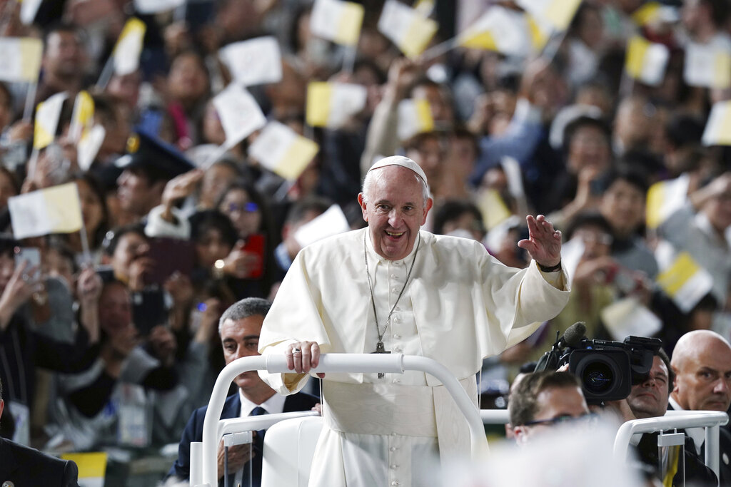 Pope Francis waves in Popemobile as he arrives for Holy Mass at Tokyo Dome Monday, Nov. 25, 2019, in Tokyo. Photo: Eugene Hoshiko / AP