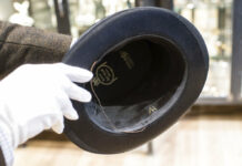 Businessman Buys Nazi Items; Plans to Donate to Jewish Group In this Wednesday, Nov. 20, 2019, photo, a person shows a personal top hat of Adolf Hitler with the initials 'AH' prior to an auction in Grasbrunn near Munich, Germany. A Geneva businessman says he has purchased Adolf Hitler's top hat and other Nazi memorabilia to keep them out of the hands of neo-Nazis and will donate them to a Jewish group. Photo: Matthias Balk / dpa via AP