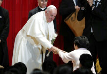 Pope Visits Jesuit Japan Community That Could Have Been His Pope Francis receives a flower after giving a speech at Sophia University in Tokyo Tuesday, Nov. 26, 2019. Photo: Kim Hong-ji / Pool Photo via AP
