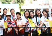 Young Thai Catholics Say They Live Peacefully as Minority A group of young Catholics wait to welcome Pope Francis at the Assumption Cathedral on Nov. 22, 2019.