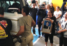 Police Arrest Gunslinging Clerk for Bringing Down Court Shooter Relatives of the plaintiff's lawyer Wijai Sukharom collecting his body from a hospital on Nov. 13, 2019.
