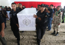 Prayuth Grants Himself Power to Impose Curfew on Deep South A Nov. 7, 2019, photo of a funeral of one of the 15 people killed in checkpoint attack in Yala province.