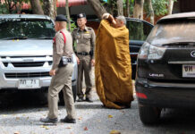 Hermit Accused of Raping 15-Year-Old Daughter A hermit, who goes by the name Paiboon, being taken to Bueng Kan city patriarch by the police on Nov. 7, 2019.