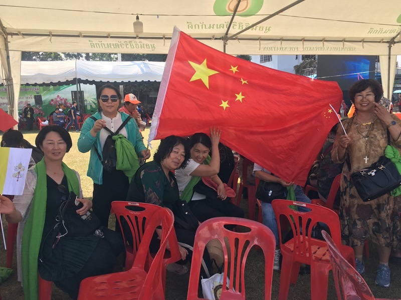 A group of Chinese nationals pose for photos at St. Peter's Parish in Nakhon Pathom province on Nov 22, 2019.