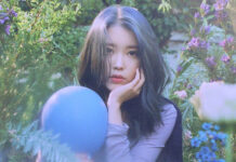 ‘IU’ to Hold Christmas Eve Concert in Bangkok IU in a promotional photo for her Love Poem extended play.