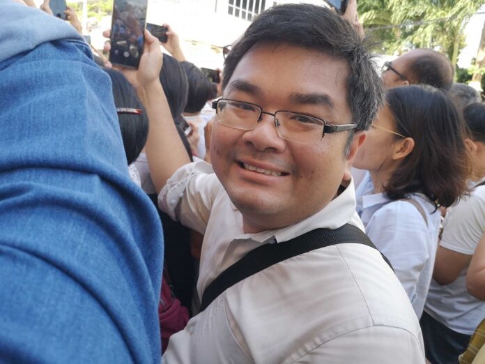 Banchaporn Boonlert-aree, a Buddhist, waits to see the Pope because he read about the papacy's crucial role in European history.