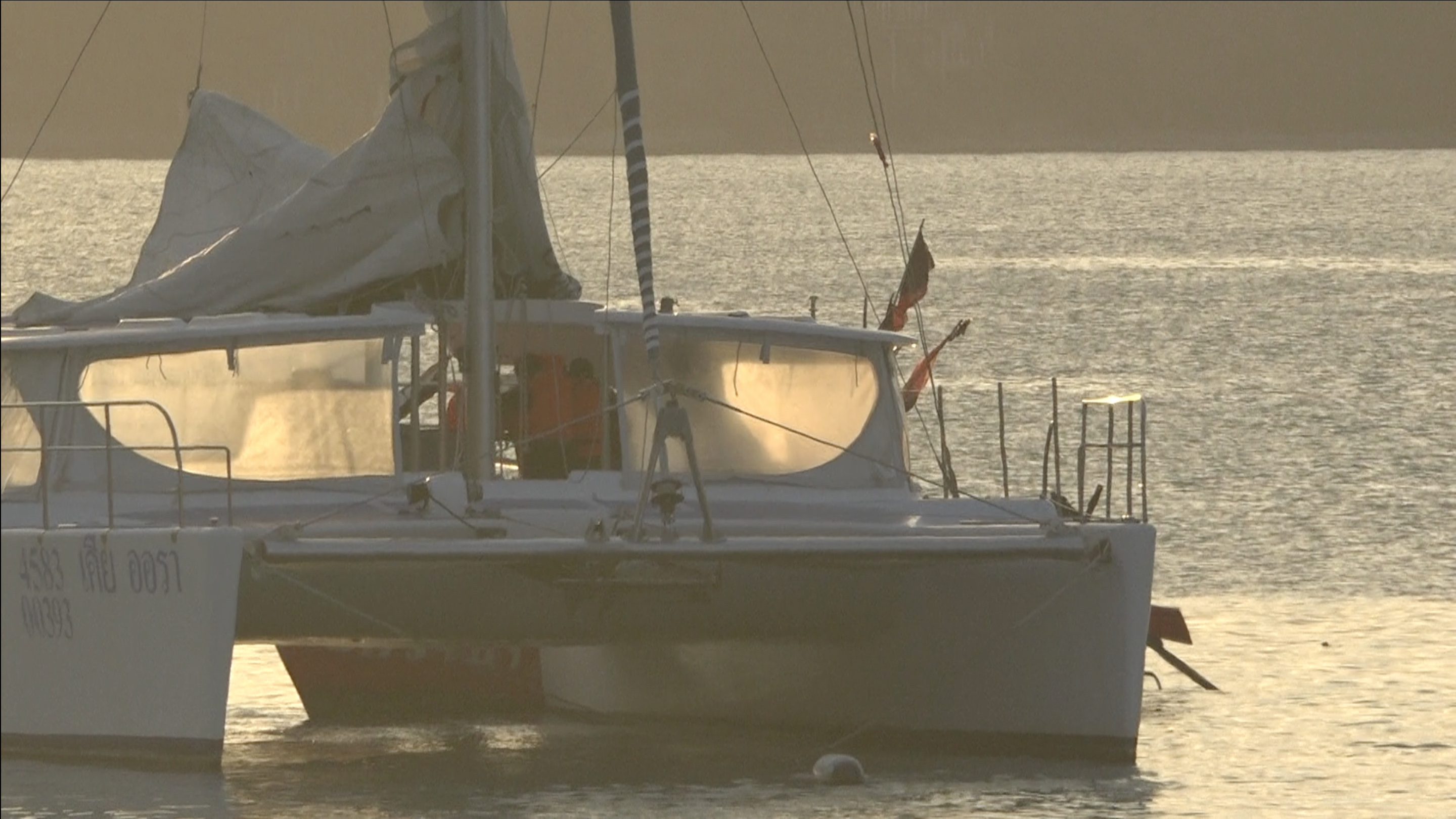 Police making arrest on a yacht.