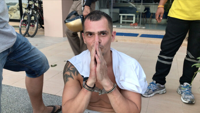 Ianin Lev Aleksandrovich apologizes to the police after his arrest on Nov. 17, 2019.