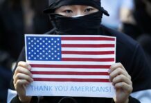 China Suspends Hong Kong Visits by US Navy, Sanctions NGOs