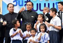 Savor Milky Food, Live Music at Samyan ‘Milk Garden’ PM Prayuth Chan-ocha and schoolchildren pose for photos at a government event to promote drinking milk. Image: Government House.