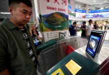 Chinese City Fully Launches Face-Scanning at Metro A man passes the ticket gate through facial recognition payment system at Zijingshan subway station in Zhengzhou, central China's Henan Province, Sept. 27, 2019. Photo: Li Jianan / Xinhua