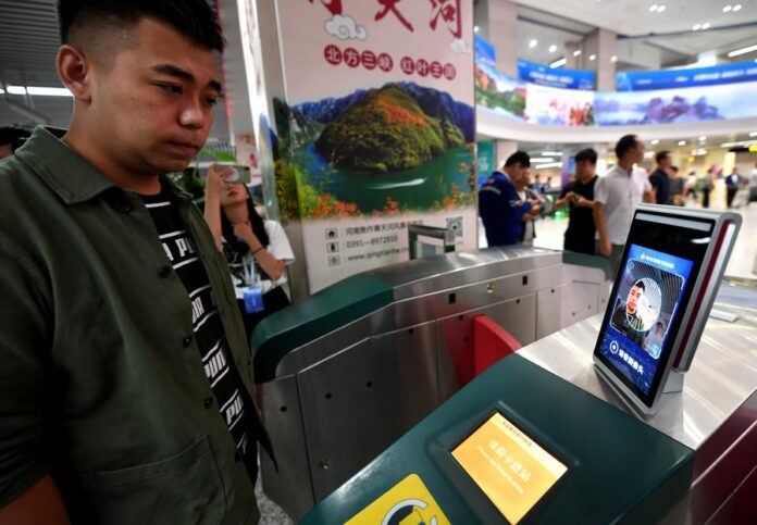 A man passes the ticket gate through facial recognition payment system at Zijingshan subway station in Zhengzhou, central China's Henan Province, Sept. 27, 2019. Photo: Li Jianan / Xinhua