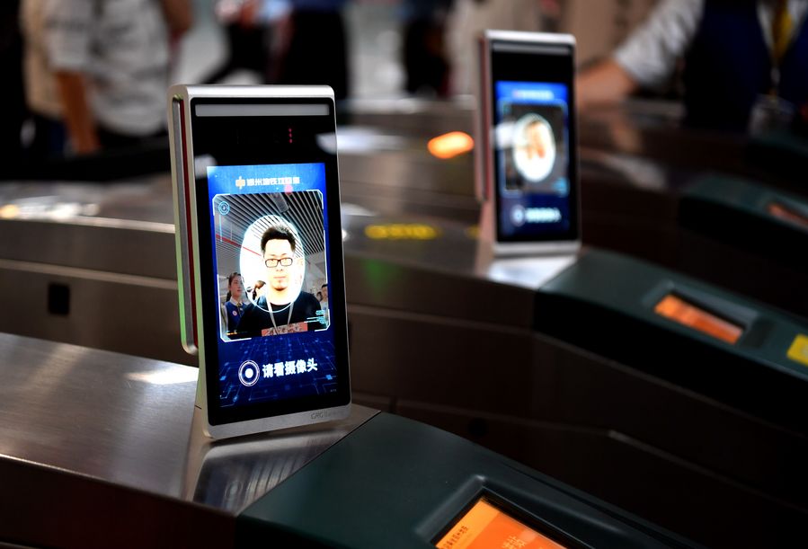 A man passes the ticket gate through facial recognition payment system at Zijingshan subway station in Zhengzhou, central China's Henan Province, Sept. 27, 2019. Photo: Li Jianan / Xinhua