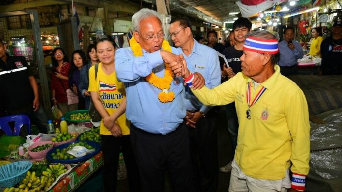 Suthep Thaugsuban campaigns on behalf of the Action Coalition of Thailand Party on Jan. 28, 2019.