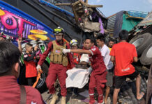 3 Days In, ‘7 Dangerous Days’ Kills 159 in 1,500+ Accidents on Thai Roads First responders carry out the bodies of two people who died in a car crash in Ayutthaya province on Dec. 28, 2019.