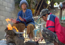 2 Elderly Men Die from Cold Weather Locals in Kranuan district, Khon Kaen, gather around a campfire to keep warm from the cold on Dec. 3, 2019.
