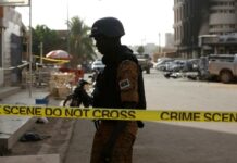 Burkina Faso Leader Says 14 Slain in Attack on Church A soldier stand guards outside the Splendid Hotel in Ouagadougou, Burkina Faso, Saturday, January 16, 2016 (File Photo). Photo: Sunday Alamba / AP