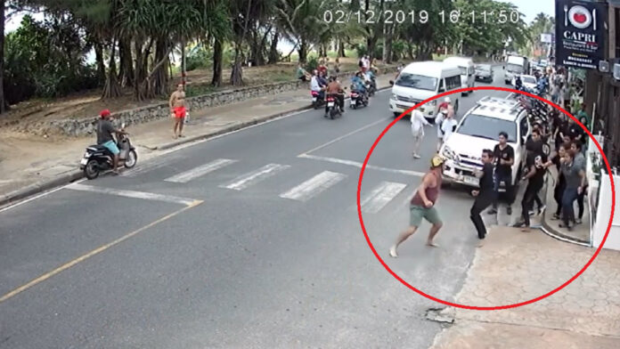 A still from CCTV footage showing a brawl between a foreigner and wait staff outside a restaurant on Karon Beach on Dec. 2, 2019.