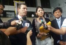 Court Fines Philip Morris $39.7 Million for Tax Evasion Gerald Margolis, center left, branch manager of Philip Morris in Thailand, talks to reporters at Criminal Court in Bangkok, Thailand, Friday, Nov. 29, 2019. The court has found the local unit of tobacco giant Philip Morris guilty of evading taxes by under-declaring the value of cigarettes it imported from the Philippines, and ordered the company to pay a fine of 1.2 billion baht ($39.7 million). Photo: AP
