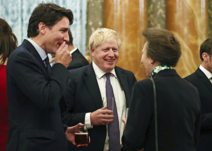 Britain's Princess Anne The Princess Royal, right, talks to NATO delegates from left, Canadian Prime Minister Justin Trudeau and Britain's Prime Minister Boris Johnson, during a reception at Buckingham Palace, in London, as Nato leaders attend to mark 70 years of the alliance, Tuesday Dec. 3, 2019. Photo: Yui Mok / AP