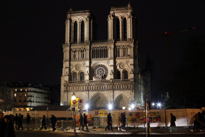 Notre Dame cathedral is pictured in Paris, Tuesday, Dec. 24, 2019. Notre Dame Cathedral is unable to host Christmas services for the first time since the French Revolution, because the Paris landmark was too deeply damaged by this year's fire. Photo: Thibault Camus / AP