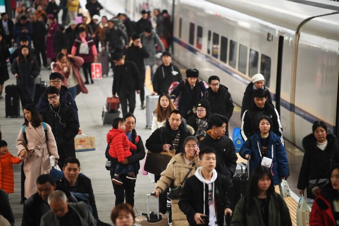 Xinhua file photo of Spring Festival train commuters.