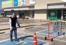 Chiang Rai Man Defends Handicap Parking Spot by Smashing Window Peerapong showed the handicap parking at Big C Chiang Rai Airport to reporters on Dec. 8, 2019.
