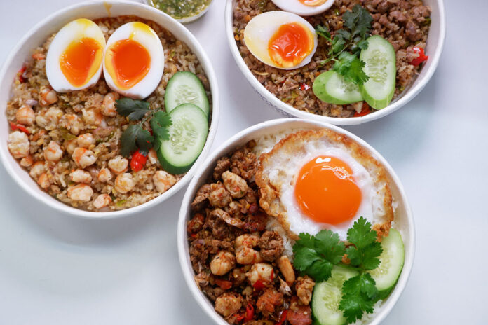 Clockwise from left: shrimp prik-klua fried rice (198 baht), pork prik-klua fried rice (113 baht), and combination prik-klua with jasmine rice (156 baht).