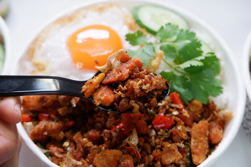 Crab roe prik-klua stir-fry (198 baht).