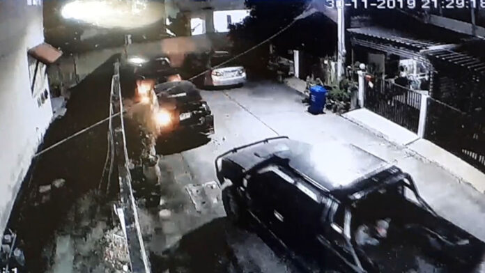 A still from CCTV footage showing Passakorn’s car ramming into the Honda City sedan on Nov. 30, 2019. A still from CCTV footage showing Passakorn’s car ramming into the Honda City sedan on Nov. 30, 2019.