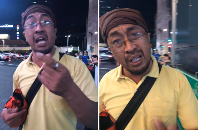 The motorcycle taxi that allegedly shoved Arielle Struhl from her Grab bike on Dec. 2, 2019 in front of Siam Paragon. Photos: Arielle Struhl / Courtesy The motorcycle taxi that allegedly shoved Arielle Struhl from her Grab bike on Dec. 2, 2019 in front of Siam Paragon. Photos: Arielle Struhl / Courtesy