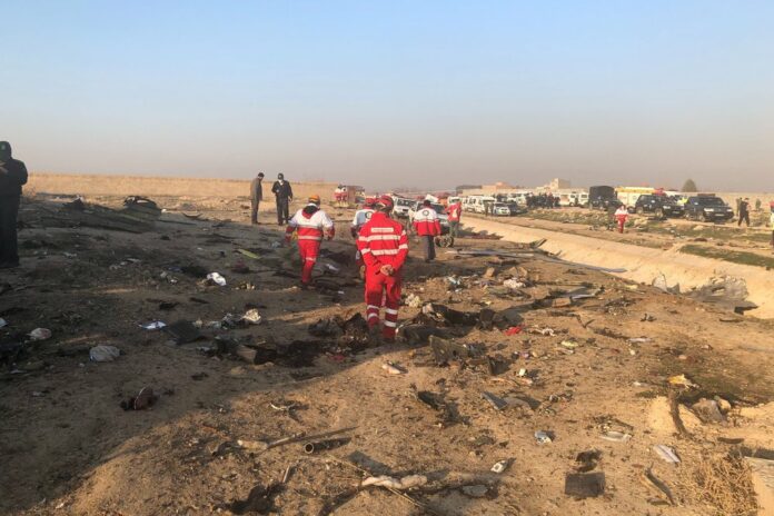 Debris is seen from a plane crash on the outskirts of Tehran, Iran, Wednesday, Jan. 8, 2020. A Ukrainian airplane carrying at least 170 people crashed on Wednesday shortly after takeoff from Tehran’s main airport, killing all onboard, state TV reported. (AP Photos/Mohammad Nasiri)