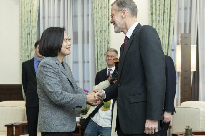 In this photo released by the Taiwan Presidential Office, William Brent Christensen, director of the American Institute in Taiwan at right meets with Taiwan President Tsai Ing-wen, at left in the Presidential Office in Taipei, Taiwan. (Taiwan Presidential Office via AP)