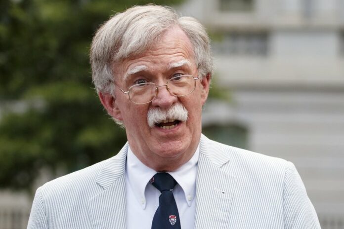 In this July 31, 2019 file photo, then National security adviser John Bolton speaks to media at the White House in Washington. Bolton says he's 'prepared to testify' in Senate impeachment trial if subpoenaed (AP Photo/Carolyn Kaster)