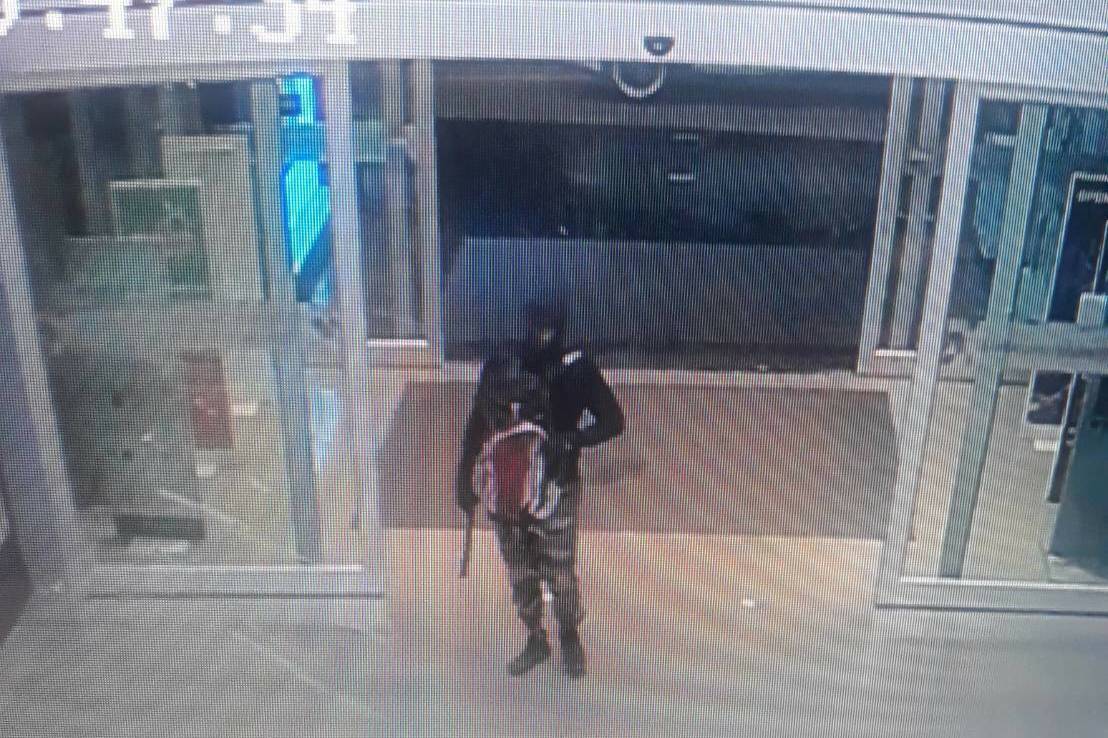 A still from CCTV footage showing the suspect walking into Robinson shopping mall with a handgun on Jan. 9, 2020.