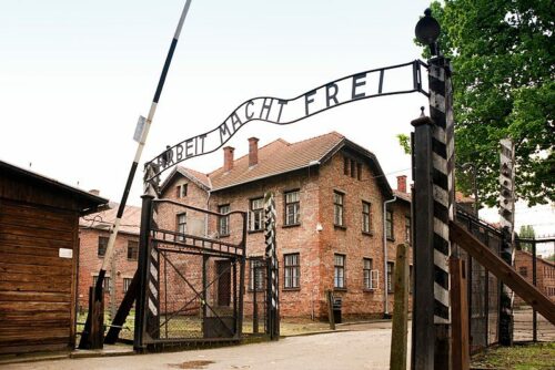 A gate of Auschwitz Concentration Camp. Photo: xiquinhosilva / Flickr