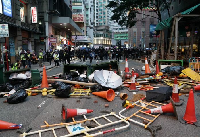 Rioters set barricades with debris on streets to block traffic on Jan. 1, 2020 in Hong Kong, China. (Xinhua)