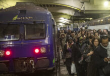 A Milestone for French Rail Strikes: 29th Day of Walkouts Commuters arrive at at Gare Montparnasse train station during the 29th day of transport strikes in Paris, Thursday, Jan. 2, 2020. The start of 2020 was the second New Year celebration in a row where Macron has faced social upheaval. Photo: Michel Euler / AP