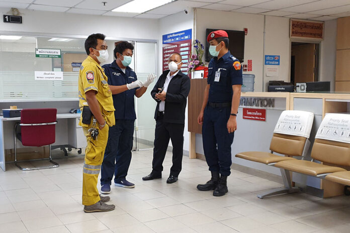 Officials prepare to examine the body of Balog Laszlo at Suvarnabhumi Airport Police Station on Jan. 26, 2020.