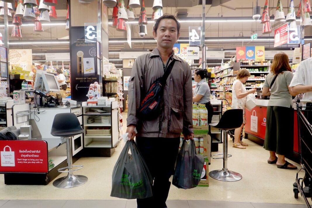 Niran Tangjitmet bring his own bags to a Tops supermarket on Jan. 2, 2020.