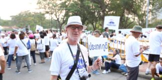 At Pro-Gov’t Walk, Supporters Rally Behind Their Embattled ‘Uncle’