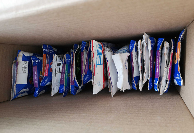 Flattened juice boxes ready to be recycled at the “Run Against Dictatorship” rally on Jan. 12, 2020.