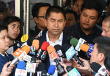 ‘Big Joke’ Says He Is Targeted For Refusing To Sign Biometric Project Surachate “Big Joke” Hakparn speaks to the media in front of Bang Rak police station on Jan. 8, 2020.