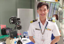 Health Official Says All Passengers are Screened For Virus at BKK Thanawut Karapakdee stands next to a thermal camera that is used to detect a fever at a quarantine checkpoint inside Suvarnabhumi Airport. Photo: Mut Karapakdee / Facebook