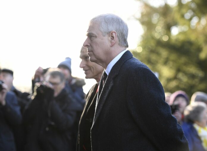 In this Jan. 19, 2020 file photo, Britain's Prince Andrew accompanies Queen Elizabeth II to attend a church service at St Mary the Virgin, in Hillington, England. (Joe Giddens/PA via AP)